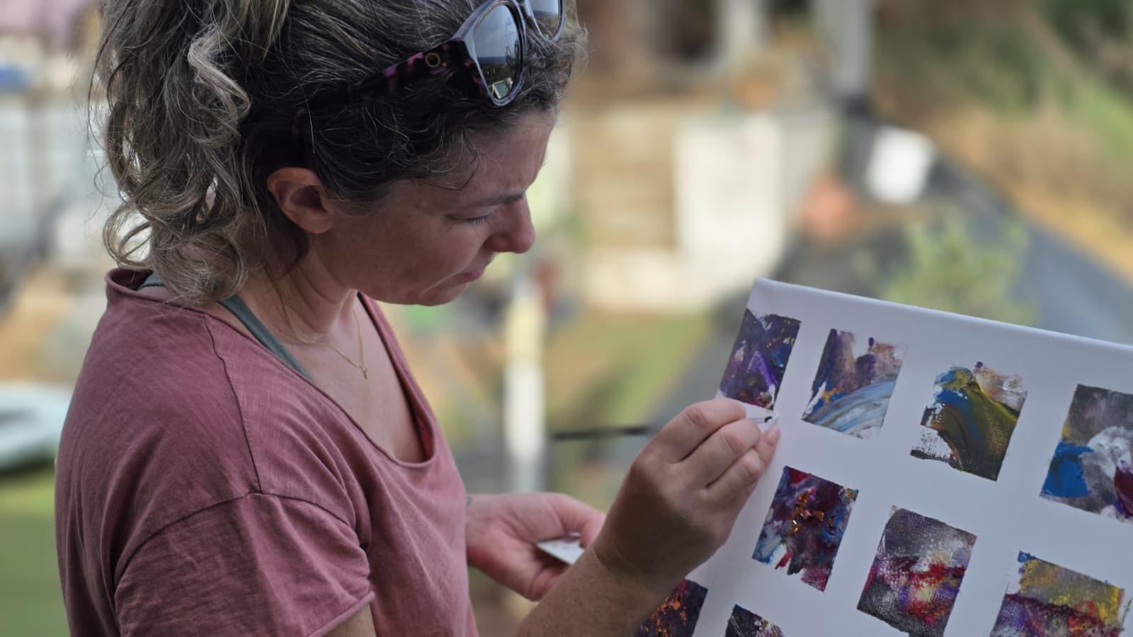 Camille painting small studies outdoors in the garden